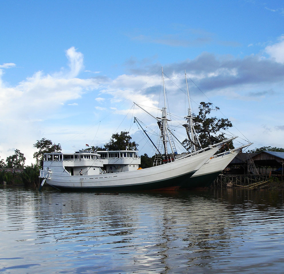 Two Cargo Phinisi on the Sangkulirang River, Borneo - Photo Copyright 2006 Michael Kasten